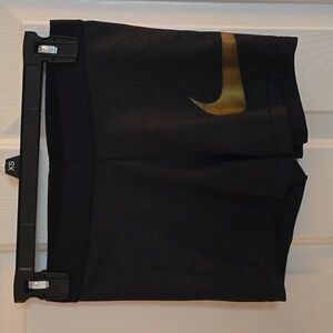 Nike Dri-Fit Spandex Shorts. Youth Girl Size Medium. Colors Black & Gold.